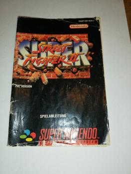 Street Fighter II Anleitung Super Nintendo ES SNSP-XW-NOE-1(Anleitung komplett, Front und Backcover mit Einrissen, Rest im sehr guten Zustand)